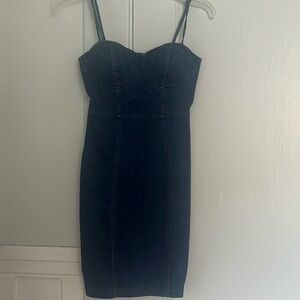 A size small blue jean dress with zipper on back.
